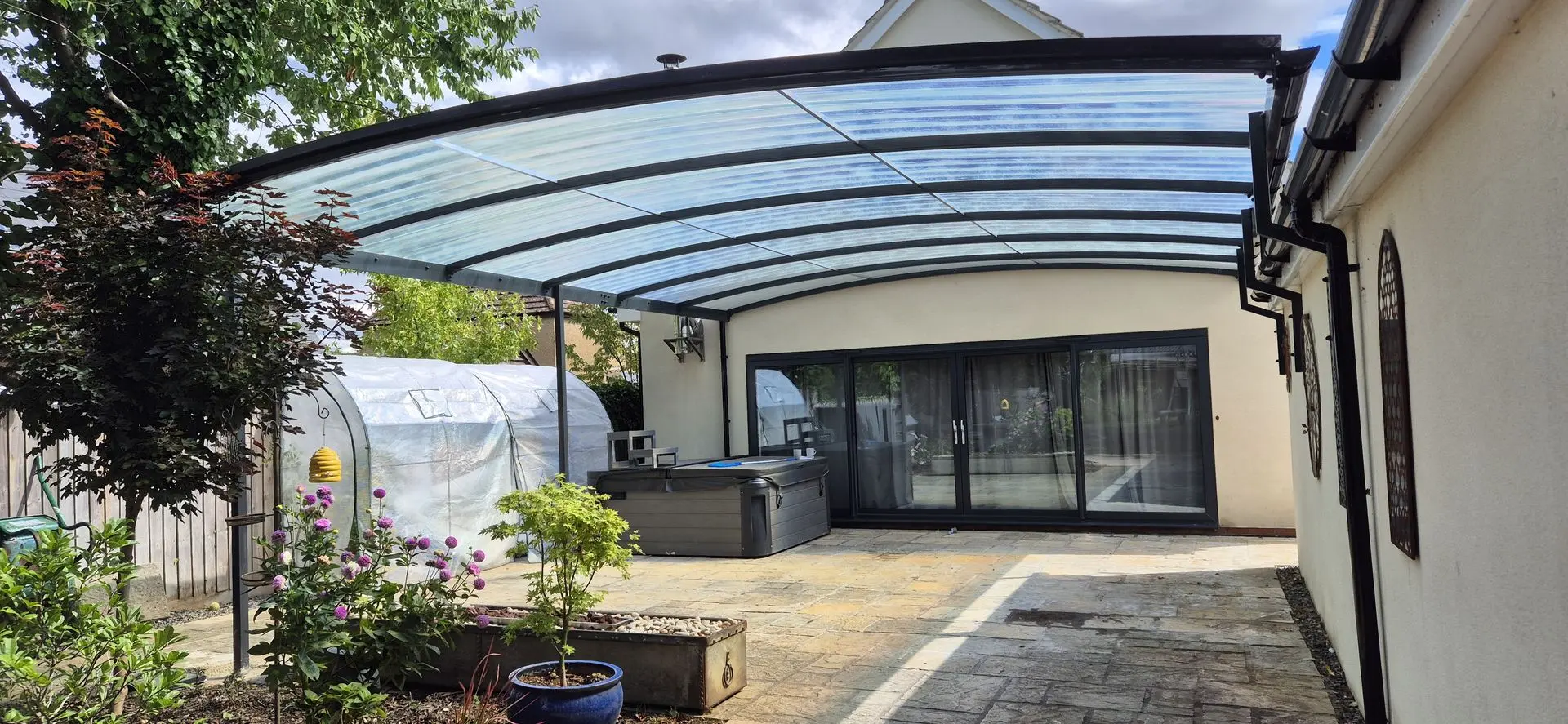 Transforming Outdoor Living with Style – 8m Archway Canopy Installation