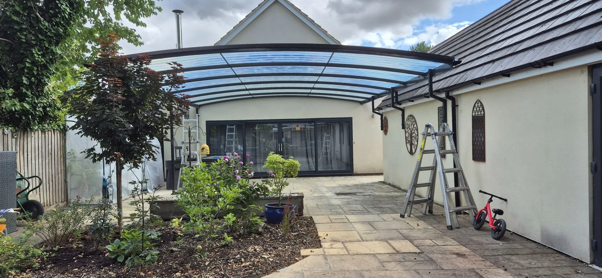 Transforming Outdoor Living with Style – 8m Archway Canopy Installation